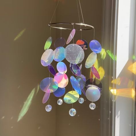 This Suncatchers item by sunlightonyou has 9948 favorites from Etsy shoppers. Ships from Paducah, KY. Listed on Jan 28, 2024 Atrapasueños Diy, Northern Lights Painting, Cd Crafts, Rainbow Maker, Room Deco, Crystal Prisms, Crystal Suncatchers, Rainbow Crystal, Cute Room Decor