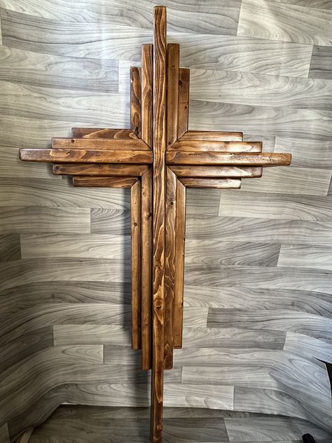 Handcrafted Rustic Layered Cross made from Pine. The cross is 5ft tall by 31in wide and 5in depth.  This would be beautiful displayed in a church, wedding, barn or home.  We are beginning our Etsy shop and take pride in each item made. The cross is one of my favorite items to craft because of its reminder that Jesus died for us.  Shipping time varies depending how it's shipped. We use standard UPS or FedEx due to size.  We appreciate your support and sharing with others. Crosses Diy, Layers Straight, Wood Crosses Diy, Rustic Wood Cross, Cross Wood, Rustic Cross, Wooden Crosses, Cross Crafts, Tower Block