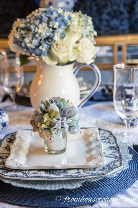 | Hydrangea-inspired Blue and White Tablescape | If you're looking for Easter dinner or spring table ideas, this blue and white table setting has a hydrangea centerpiece that is perfect for the occasion. The blue and white place setting is really pretty, too. White Place Setting, Blue And White Table Setting, White Table Setting, White Tablescape, Hydrangea Potted, White Table Settings, Deco Buffet, Hydrangea Centerpiece, Hydrangea Arrangements