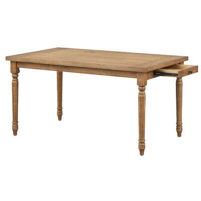 This dining table has a classic, traditional style that works so well with many design schemes. Plus, it offers storage, which we know you never have enough of. It is made from a blend of solid and engineered wood in a driftwood stain. The graceful turned legs add to the timeless appeal. What’s more, two drawers on either end - each with a simple button knob - are just right for storing placemats, napkins, or candles. This table comfortably accommodates six for a seated meal or is an ideal buffe Small Rectangle Dining Table, Dining Table With Drawers, Round Extendable Dining Table, Modern Farmhouse Table, Round Wood Dining Table, Table With Drawers, Drop Leaf Dining Table, Rectangle Dining Table, Oak Table