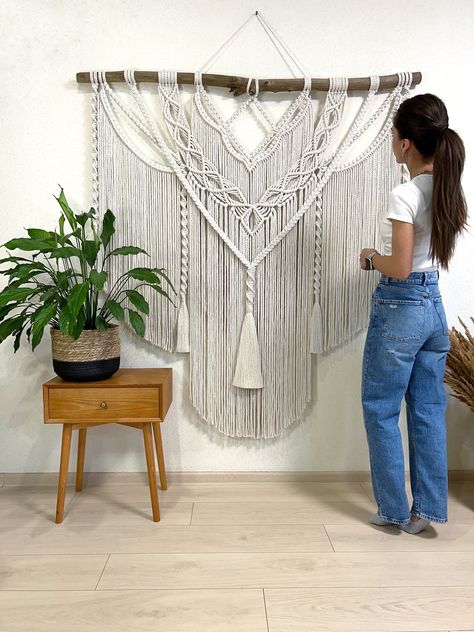 Extra large macrame wall hanging decor can be an unique addition to any room in your house, or a great gift. The wall hanging will make your bedroom, living room or nursery cozy and homely This macrame backdrop will also be perfect for a wedding arch or boho wedding photo zone The item is made of unbleached twisted cotton cord (diameter of 6 mm) Natural material Before making this macrame I'll send you pictures of pieces of wood for choosing Size 58x61 inches (148x155 cm) +- Custom orders are we Wide Macrame Wall Hanging, Extra Large Macrame Wall Hanging, Macrame Wall Hanging Decor, Wall Decor Macrame, Wall Macrame, Macrame Headboard, Macrame Backdrop, Wall Hanging Shelves, Bedroom Wall Hangings