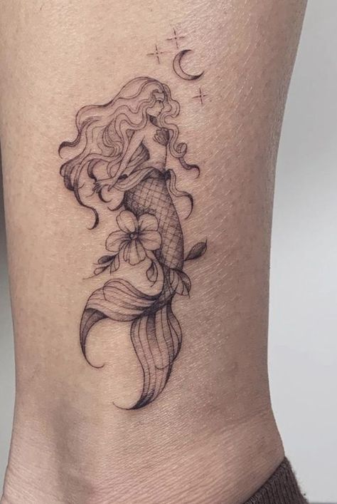 17 Magical Little Mermaid Tattoo Ideas for a Fantastical 2024 - Get Inspired Now! Little Mermaid Tattoo Ideas, Mermaid Tattoo Ideas, Small Mermaid Tattoo, Ocean Tattoo Ideas, Mermaid Sleeve Tattoos, Ariel Tattoo, Little Mermaid Tattoo, Siren Tattoo, Mermaid Tattoo Designs