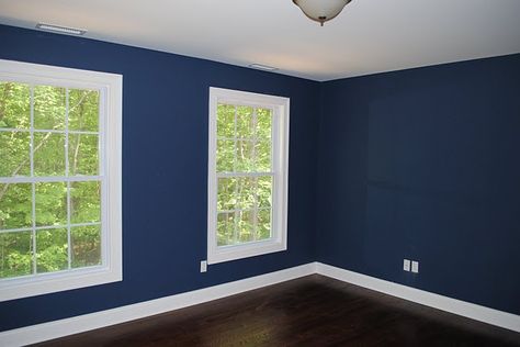 Benjamin Moore's Newburyport Blue (HC-155).  How amazing is this blue? Especially with the white trim? Benjamin Moore Newburyport Blue, Blue Bedroom Ideas For Couples, Newburyport Blue, Blue Benjamin Moore, Apartment Decorating For Couples, Blue Paint Color, Blue Bedroom Walls, Blue Bedroom Decor, Bedroom Ideas For Couples