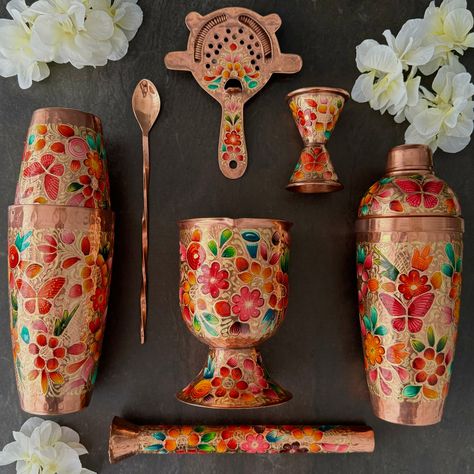 **IMPORTANT INFORMATION TO CONSIDER BEFORE ORDERING: PRODUCTS ARE 100% HANDMADE, THEREFORE, ALLOW 20 DAYS FOR PRODUCTION PER PRODUCT MENTIONED ON "PRODUCT PAGE" OF ITEM WITH TENTATIVE SHIPPING AFTER DEADLINE DATE. DEADLINE TO ORDER: 9/30/24 Mexican Handmade Copper Barware & Bar Tools- LYYE Flowers Discover the ultimate Mexican artisan copper bar set tools—a must-have for the best bartending cocktails. Hand-hammered, hand-painted, and hand-engraved by skilled Mexican artisans, this set is a true Modern Mexican Dishware, Mexican Colors Kitchen, Mexican Bar Decor, Mexican Serveware, Mexican Kitchen Decor Ideas Hacienda Style, Funky Home Bar, Mexican Bar Ideas, Mexican Cottagecore, Mexican House Decor