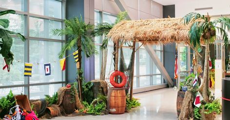 The largest event of the season was a family oriented tropical holiday extravganza! Five rooms and several hallway spaces were transformed i... Booth Activation, Seattle Pike Place Market, Marina Bar, Seattle Pike Place, Tropical Xmas, Dance Diy, Mystery Island, Vbs Decorations, Tet Holiday