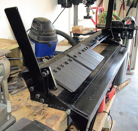 This bench-top box/pan brake can bend sheet metal into various shapes. It mounts to a workbench. It can accept up to four foot wide stock and bend 135 degrees. With the various width teeth, they can be adjusted to fit the width of the bend needed within minutes with one wrench. The clamping thickness can be adjusted from 0 to about 0.25 inches, but I would be extremely lucky to bend something that thick. The throat can open to over four inches.  This brake was built from scrap I received for... Sheet Metal Bender, Sheet Metal Brake, Sheet Metal Tools, Metal Bender, Metal Shaping, Metal Fab, Sheet Metal Fabrication, Metal Bending Tools, Fabrication Tools