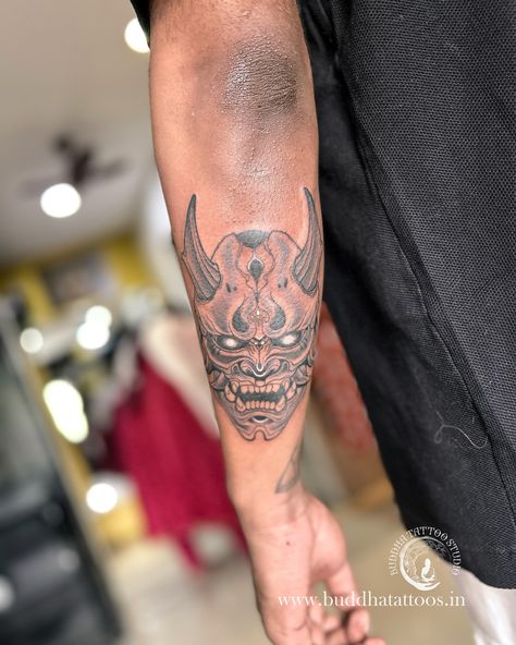 Oni mask tattoo symbolizes protection, power, and the balance between good and evil. In Japanese folklore, Oni are demons or ogres that can be both malevolent and protective, depending on the context. The tattoo often represents the wearer’s struggle with their darker impulses or a reminder of the consequences of evil deeds. It can also signify strength in overcoming adversity. : : : : : : : : : : : : : #artist #artistatwork #artistsofinstagram #bodyart #besttattoos #buddhatattoostudiohydera... Dynamic Tattoo Ink, Oni Mask Tattoo, Buddha Tattoo, Oni Mask, Mask Tattoo, Overcoming Adversity, Indian Tattoo, Japanese Folklore, Good And Evil