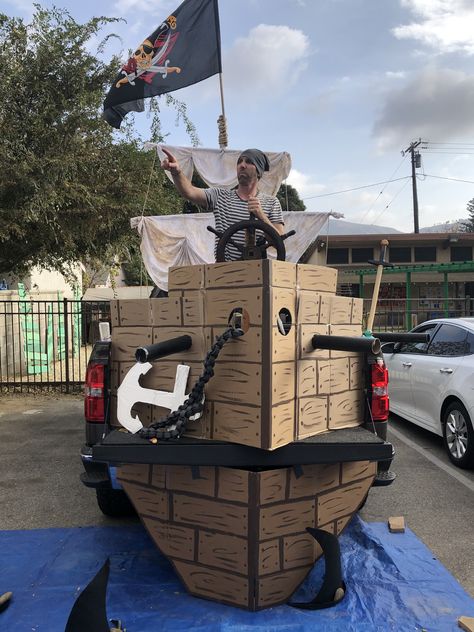 Golf Cart Decorated Like A Pirate Ship, Pirate Car Decorations, Pirate Themed Parade Float, Pirates Of The Caribbean Float Ideas, The Goonies Trunk Or Treat, Pirate Ship Trunk Or Treat Truck, Pirate Ship Parade Float Ideas, Pirate Truck Or Treat, Halloween Shipwreck Diy