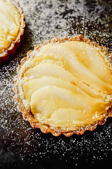 Mini Pear and Almond Tartlets, also known as Pear and Frangipane! Made with whole wheat tart crust, these sweet tarts are perfect for the holidays! | Zestful Kitchen #frangipane #pearfrangipane #peartart #peartartlets #pearalmondtart Almond Tartlets, Pear Tartlets, Wheat Pie Crust, Blue Cheese Tart, Whole Wheat Pie Crust, Pear And Almond Tart, Tart Crust Recipe, Baking Weights, Healthy Holiday Desserts