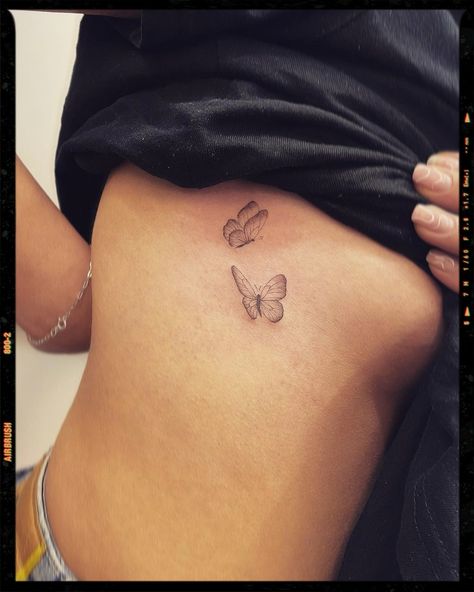 Butterfly Tattoos Inspiration - Rib tattoo inspiration Butterflies In Flight Tattoo, Cloudless Sulphur Butterfly Tattoo, Silhouette Butterfly Tattoo, Butterfly Flying Tattoo, Flying Butterfly Tattoo, Wind Tattoo, Small Back Tattoos, Shadow Tattoo, Silhouette Butterfly