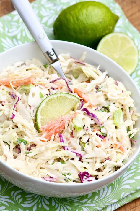 Cumin Lime Coleslaw's crisp texture, vibrant flavor and impressive versatility might just make this super simple side dish a new favorite! Slow Cooker Taco Chicken, Lime Coleslaw, Slow Cooker Taco, Taco Side Dishes, Taco Chicken, Slow Cooker Beans, Easy Coleslaw, Slow Cooker Tacos, Burrito Bowls