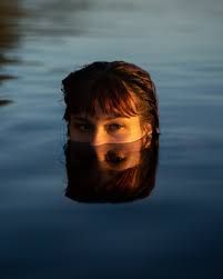 Womans Face on Water · Free Stock Photo Head In Water Photography, Person In Water Aesthetic, Person Submerged In Water, Head Peaking Out Of Water, Free Woman Painting, Head Submerged In Water, Face In Water Painting, Water Portrait Art, Head Half In Water