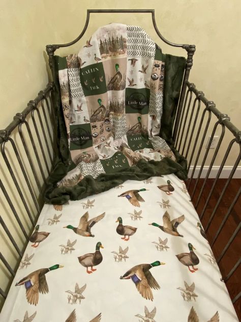 Whole cloth patchwork print blanket in a duck hunting woodland theme print. (fabric is printed to look like a patchwork blanket) Blanket measures approximately 42" x 50" Back of blanket and front border is super soft minky fabric. Fitted cotton crib sheet fits standard size crib mattresses 28" x 52" This item is made to order. Please allow 3 - 4 weeks production time. Don't see exactly what you are looking for? Contact us with any questions. Since our bedding is made to order we can make changes and customize the pieces just for you. Little Hunter Nursery, Ducks Nursery Theme, Duck Hunting Themed Nursery, Duck Nursery Boy, Baby Boy Hunting Nursery, Hunting Nursery Theme Boy, Hunting Nursery Theme, Baby Nursery Theme Ideas, Hunting Theme Baby Shower