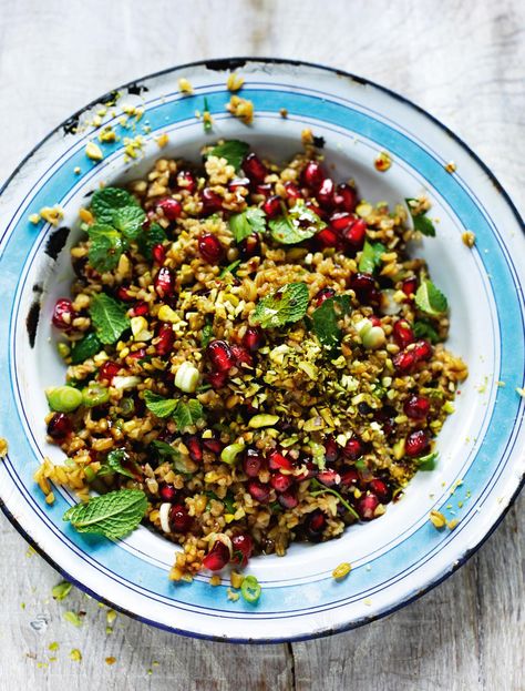 Freekeh Salad recipe from Rick Stein's brilliant cookbook From Venice to Istanbul. Perfect as an accompanying pilaf or summer side salad, this Middle-Eastern inspired treat is flavoured with pomegranate seeds, pistachios, mint and spring onion. Freekeh Salad, Freekeh Recipes, Pool Food, Bbq Salads, Rick Stein, Salad Buah, Yummy Salads, Resep Salad, Grain Salad