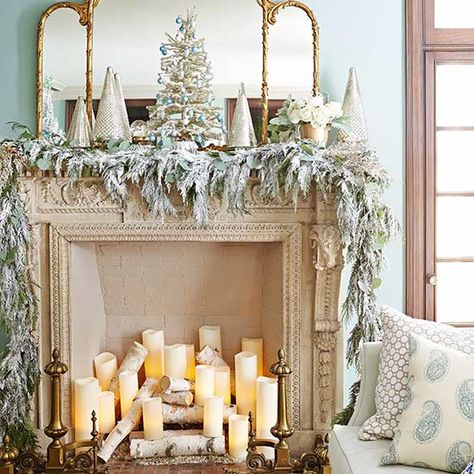 Flocked Garland. Look at the fireplace with logs and candles Fireplace With Candles, Christmas Candle Decorations Ideas, Flocked Garland, Holiday Mantel Decor, Garland Ideas, Diy Christmas Garland, Christmas Candle Decorations, Holiday Mantel, Christmas Fireplace Decor