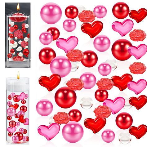 PRICES MAY VARY. Package includes: 12000 * clear water gel beads, 20 * red heart, 20 * pink heart, 22 * red pearl, 22 * pink pearl, 4 * big rose, 4 * small rose. These Valentines Day vase fillers are enough for you to fill at least 10 vases and create attractive floating candle centerpieces for your special day!. Note: Candles and vase are not included. Just put the water gel bead in water and absorb enough water to make it expand. The water jelly beads will grow to 10x that of original size. Th Floating Candles Centerpiece, Floating Candle Vase, Beaded Christmas Decorations, Pink Wedding Decorations, Floating Candle Centerpieces, Valentine Candles, Christmas Vases, Heart Vase, Hari Valentine