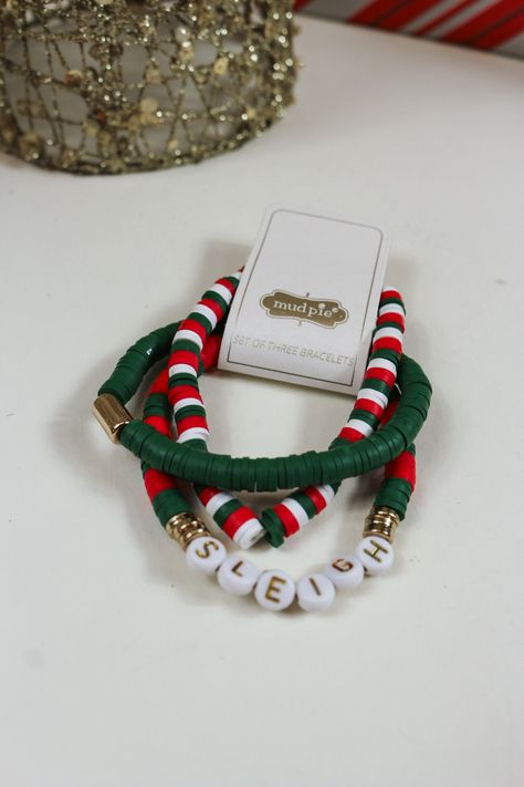 Embrace the festive season with our Christmas Holiday Beaded Bracelets! Available in 3 vibrant colors, these bracelets add a touch of holiday cheer to any outfit. Handcrafted with exquisite beads, each bracelet is a unique statement piece. Perfect for spreading joy and gifting to loved ones! Holiday Bracelet Ideas, Christmas Bracelets Clay Beads, Christmas Bracelet Ideas String, Christmas Jewelry Diy Bracelets, Cute Christmas Bracelets, Winter Clay Bead Bracelets, Christmas Clay Bead Bracelet Ideas, Christmas Bracelets Beaded, Christmas Clay Bead Bracelets