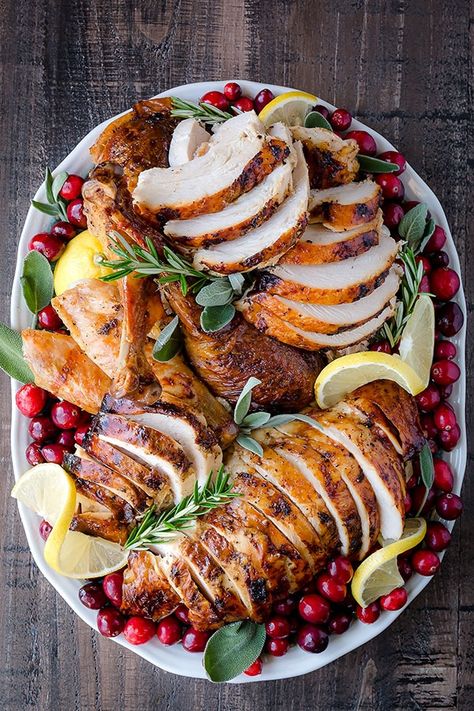 Calling all lemon lovers!!! This lemon herb roast turkey is for you! Infused with tangy lemon butter inside and rubbed with mixture of lemon pepper, garlic & herb seasonings and lemon zest, this roast turkey will surprise your taste buds (in a pleasant way!) this Thanksgiving. #ThanksgivingTurkey #turkey #thanksgivingrecipe #thanksgiving #wholeturkey Herb Roasted Turkey, Herb Turkey, Roast Turkey Recipes, Christmas Turkey, Oven Roasted Turkey, Grilled Turkey, Roast Turkey, Lemon Herb, Smoked Turkey