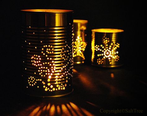 Tin Can Lantern Christmas Patterns Soup Can Crafts, Diy Outdoor Lanterns, Tin Can Lights, Can Lanterns, Tin Can Lanterns, Lantern Ideas, Eco Friendly Christmas, Tin Can Crafts, Diy Cans