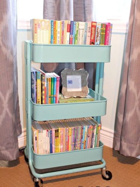 To keep story time spontaneous (but ensure books won't clutter every free corner of your house), file your kids' favorite reads in the deep bins.  See more at Kylie M. Interiors » Raskog Ikea, Ikea Raskog Cart, Ikea Raskog, Storage Tips, Dekorasi Kamar Tidur, Ikea Storage, 아파트 인테리어, Book Storage, Toy Rooms