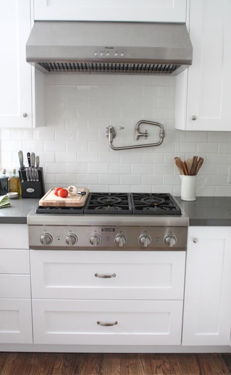 when i build my dream kitchen, it will have a gas range like this. and there will most definitely be a faucet above to fill pots with water. best idea ever. Kitchen Aid Appliances, Kitchen Hoods, Big Reveal, Kitchen Stove, Gas Range, Kitchen Redo, Kitchen Reno, Updated Kitchen, Kitchen Remodel Idea