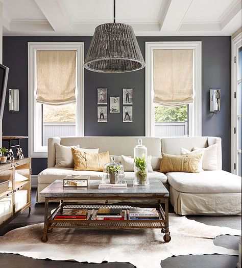 The color gray gives off modern energy in this contemporary yet rustic space. More gray color schemes: http://www.bhg.com/decorating/color/schemes/gray/?socsrc=bhgpin080713rusticchandelier=7 Living Room Baskets, Sofas For Small Spaces, Gray Walls, Viria, Shades Of Gray, Design Del Prodotto, White Furniture, Living Room Grey, A Living Room