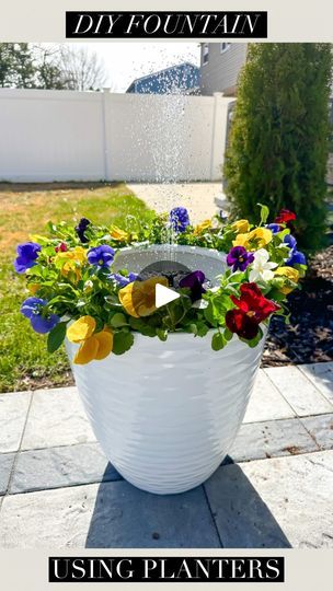 2.4M views · 115K reactions | Easily create your own fountain for your outdoor space 😍🤗 It is seriously so peaceful and pretty! 

All you need for this are planters, potting soil, and some flowers 🌸 Then add the solar powered fountain maker inside your middle planter with water (make sure the hole is plugged up or there is no hole in this one). Cant wait to get all my outdoor furniture out and enjoy! 

Everything I used for mine is in my LTK 😍

#springtime #outdoorspace #backyarddesign | Tara Panasiuk | the_magnolia_mercantile · Original audio Pot Planting Ideas Outdoor, Flower Pot Solar Fountain, Driveway Flower Pots, Flower Pot With Solar Fountain, Planting In Pots Outdoor, Planter Solar Fountain Diy, Gardens With Fountains, Solar Fountain Planter, Flower Pot Water Fountain