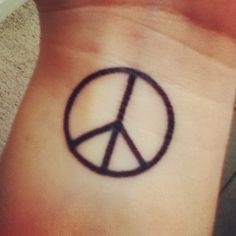 Peace sign tattoo, just looking for placement Peace Symbol Tattoo, Peace Sign Tattoo, Peace Sign Tattoos, Peace Tattoos, Sign Tattoo, Small Tattoos With Meaning, Wrist Tattoos For Guys, Symbol Tattoo, Men Tattoos