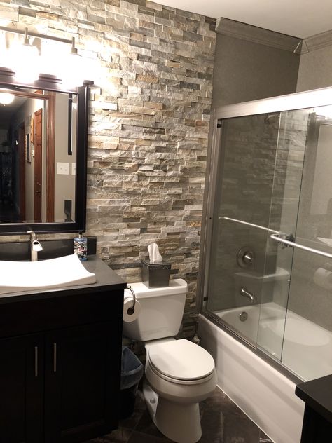 Ledger stone accent wall Bathroom Rock Walls, Rock Wall Bathroom, Bathroom Wallpaper Ideas Accent Wall, Stone Wall Bathroom, Stand Up Shower Remodel, Stone Bathroom Wall, Bathroom Rock, Tile Accent Wall Bathroom, Bathroom Accent Wall Ideas