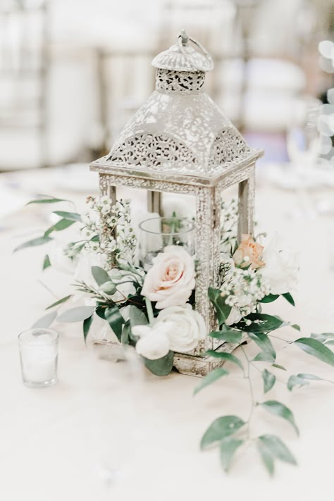 Lantern Bridal Bouquet, White Lantern Wedding Decor, White Lanterns Wedding Centerpieces, Floral Lantern Centerpieces, Blush Pink And Sage Green Wedding Centerpieces, Lantern Floral Arrangements, White Lantern Decor, White Lantern Centerpieces, Wedding Ceremony Arches