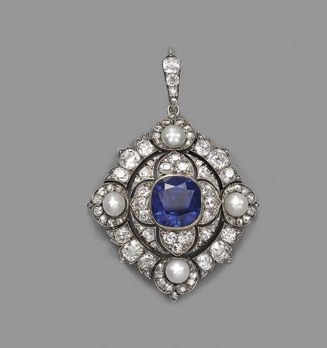 A FINE ANTIQUE SAPPHIRE, DIAMOND AND PEARL PENDANT/BROOCH The central cushion-shaped sapphire weighing 11.88 carats within old-cut diamond border of quatrefoil design to the pearl and diamond surround, mounted in silver and gold, with fittings for brooch, circa 1880, 6.4 cm. high, in red leather fitted case Pearl Jewels, Solitaire Pendant Necklace, Sparkly Things, Brighton Jewelry, Deco Jewelry, Antique Diamond, Victorian Jewelry, Vintage Jewels, Sapphire Jewelry