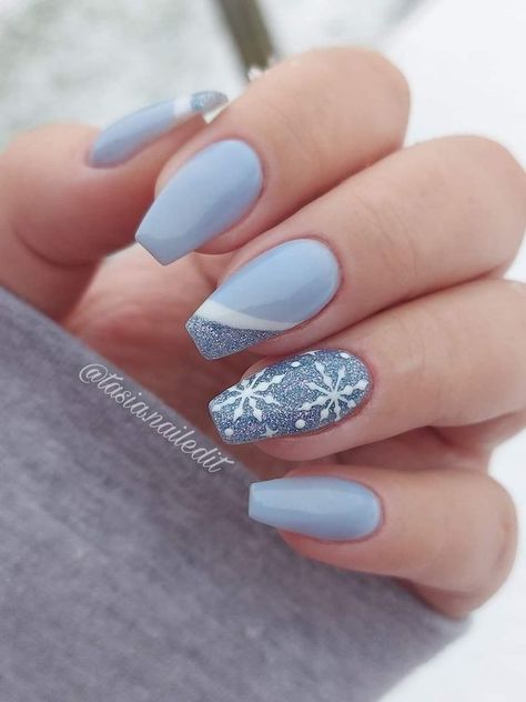 15 Short Winter Nail Ideas for 2023-2024 - thepinkgoose.com Winter Theme Nails Acrylic Short, Nails Design December, December Nails Blue And Silver, Blue Nails White Snowflake, Christmas Nail Art Designs Blue, Blue Nails Ideas Winter, Dusty Blue Nails Acrylic Designs, White And Blue Nails Winter, Blue Short Christmas Nails