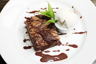 Date Night Brownies | 10 Best Vegetarian Restaurants In London | British Vogue Dairy Free Vanilla Ice Cream, Vegan Chocolate Brownies, Brownie Ice Cream, Dessert Plating, Brownie Desserts, Vegetarian Restaurant, Cream Desserts, Vegan Restaurants, Plated Desserts