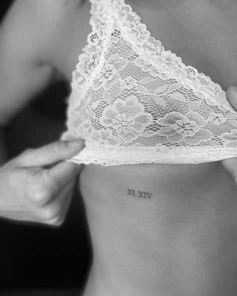 Coordinate Rib Tattoo, Tattoo Roman Numeral Fonts, Rib Roman Numeral Tattoo, Date Rib Tattoo, Roman Letter Tattoo, Roman Numeral Rib Tattoo, Roman Letters Tattoo, Roman Numeral Tattoo Placement, Fine Line Roman Numeral Tattoo