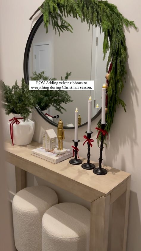 POV: Adding velvet ribbons to everything during Christmas 🎄🎁🥰 I don’t know about you but I’m obsessed adding ribbons everywhere… 🫶🏻🎄… | Instagram Christmas Decoration Console Table, Christmas Bow On Mirror, Red Velvet Ribbon Christmas Decor, Christmas Console Table Decor Ideas, Console Table Christmas Decorating, Console Table Decorating Christmas, Console Table Christmas Decor Ideas, Entryway Ideas Christmas, Console Christmas Decor