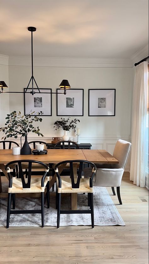 I spent months looking for the perfect dining table and this one does not disappoint! Its extendable up to 102inch with 8 chairs fitting comfortably! Looks modern and sleek! #modernfarmhousestyle #diningroomideas #diningtablewithchairs #diningtabledecor #diningroomtable #diningroomdecorideas #modernfarmhousedecor Wishbone Chair Dining Room, Wishbone Dining Chairs, Dining Room Arrangement, Modern Farmhouse Dining Table, Japandi Home Decor, Dining Room Area Rug, Neutral Dining Room, Dining Room Area, Farmhouse Dining Rooms Decor