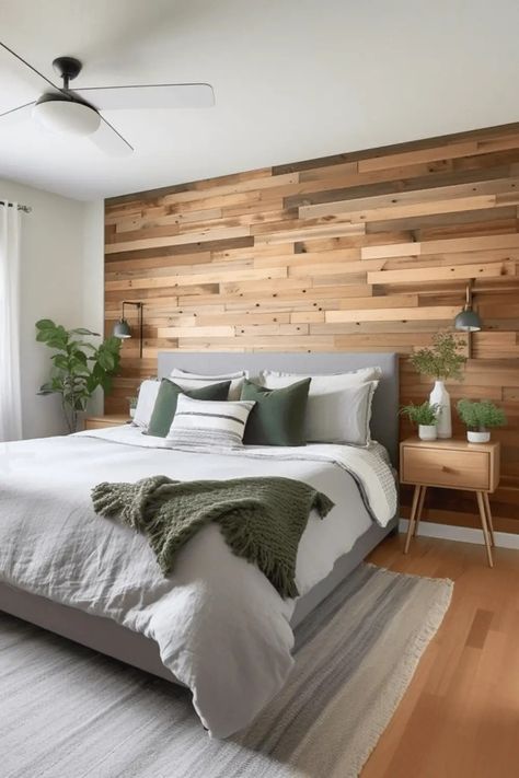 Discover unique ways to adorn the wall above your headboard and make a statement in your sanctuary! 🌟 #DecorIdeas #InteriorDesign Black Wall Wood Headboard, Wall As Headboard, Black Accent Wall Bedroom Wood Headboard, Wood Headboard On Brick Wall, Wood Plank Headboard Wall, Reclaimed Wood Headboard Bedroom, Bedroom Interior Simple, Modern Rustic Bedroom Ideas, Chocolate Bedroom Ideas