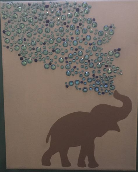 I got this idea from other pins I've seen. I made this for my sister. I painted the canvas light blue and used my cricut to help make an elephant stencil. I pieced together two different elephant silhouettes to create one I liked which I hand painted onto the canvas. The gems, glitter glue, paint, and canvas were all purchased at Walmart. Elephant Stencil, Glitter Paint For Walls, Elephant Crafts, Elephant Silhouette, Glitter Wall, Simple Canvas Paintings, Glitter Canvas, Glitter Art, Glitter Glue