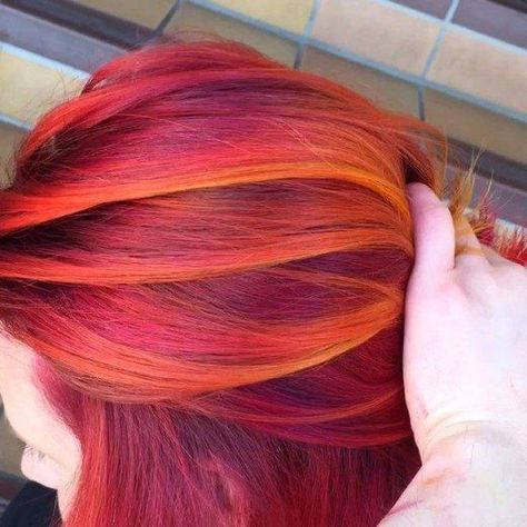 Pravana Vivids Mix. Hairstylist Guy Tang created this incredible blend by using Pravana Vivids Neon Orange Yellow, Orange, Magenta, Red, and Wild Orchid. To recreate this look, try using Magenta and Wild Orchid on the roots, Red on the mids and lower layers, and Neon Orange Yellow and Orange on ends! Cheveux Oranges, Sunset Hair, Pravana Vivids, Dyed Red Hair, Guy Tang, Bright Red Hair, Bright Hair, Wild Hair, Wild Orchid