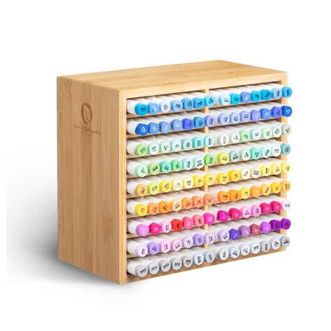 PRICES MAY VARY. CRAFTED WITH ELEGANCE FROM NATURAL BAMBOO: The Ohuhu Bamboo Marker Organizer is expertly made from bamboo, ensuring a high-quality storage solution. It's corrosion-proof, easy to clean, and environmentally friendly. GENEROUS STORAGE FOR EFFICIENCY: With 18 compartments, this marker holder can hold up to 126 alcohol markers. Keep your markers organized, clean, and ready to use. It's perfect for art teachers, students, and anyone seeking to keep their art supplies impeccably arran Marker Organizer, Stationary Organizer, Alcohol Art, Marker Holder, Pencils Art, Ohuhu Markers, Stationary Organization, Marker Storage, Pens Pencils