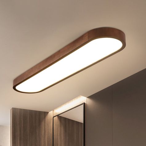 This Oblong Surface Mounted LED Ceiling Light is the perfect addition to any home. The sleek and modern design will give your space a stylish edge, and the natural Timber finish will add a warm touch to any home. The brown finish is also fade and heat resistant, meaning it will last a long time in a variety of climates. The simple flush mount design means it can either be mounted on the wall or ceiling depending on your preference.The light is made of high quality metal for durability and comes Closed Kitchen Lighting, Ceiling Lights Mounted, Surface Mounted Lights Ceilings, Surface Mount Light Fixture, Modern Surface Mount Lighting, Kitchen Ceiling Mounted Lights, Outdoor Ceiling Lamp, Ceiling Lights Low Ceiling, Surface Mounted Ceiling Lights