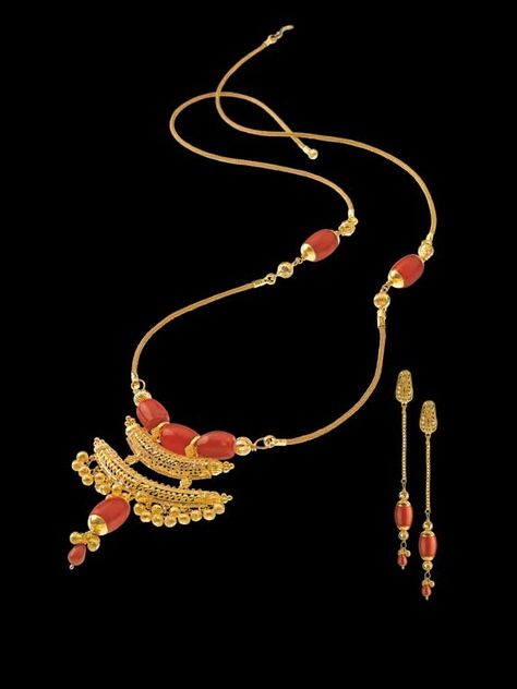 Jugal Bandi Necklace : A duet of gold and fire-red corals, this ultra light casual necklace carries the charm of a mangal-sutra but it works equally as an ornament for festive occasions. Red Coral Necklace Indian Gold, Coral Necklace Indian, Coral Mangalsutra, Coral Necklace Indian Gold, Coral Jewelry Set, Mangal Sutra, Gold Jewelry Outfits, Antique Gold Jewelry Indian, Red Coral Necklace