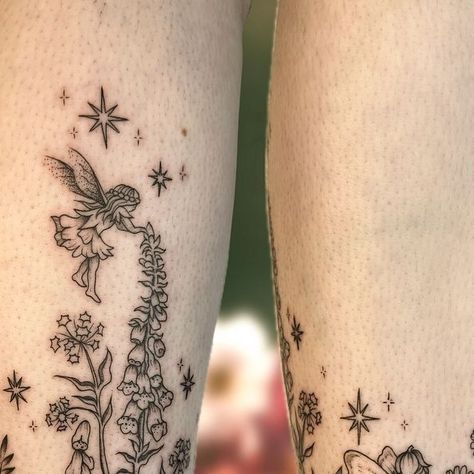 Rachel🌿🖋🍂 on Instagram: "Oh to live in a fairy garden surrounded by foxgloves and sitting on mushrooms🥲 had a class time doing this flash piece ankle wrap for the most wonderful client, yall may have seen it on my reel the other day but thought it deserved a closer look hehe! :) #tattoo #fineline #fairytattoo #fairycore #cottagecore #botanicaltattoo #mushroomtattoo" Fairy Ring Tattoo Ankle, Whimsical Fairy Tattoo Sleeve, Fairy Garden Ideas Tattoo, Fairy Ring Tattoo Elbow, Mushroom Garden Tattoo, Zelda Fairy Tattoo, Fairy Garden Tattoo Sleeve, Cute Fairy Tattoo, Mushroom Fairy Tattoo