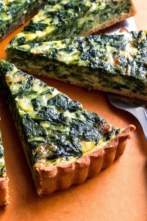 NYT Cooking: This is a classic combination for a quiche, but it’s lighter, with <a href="http://cooking.nytimes.com/recipes/1016715-whole-wheat-yeasted-olive-oil-pastry">a whole-wheat and olive oil crust</a>. If you don't have the time to make the crust, store bought will work just fine. Pizza Roll, Plats Healthy, Onion Tart, Spinach Pie, Fine Cooking, Savory Tart, Nyt Cooking, Recipes Crockpot, Quiche Recipes