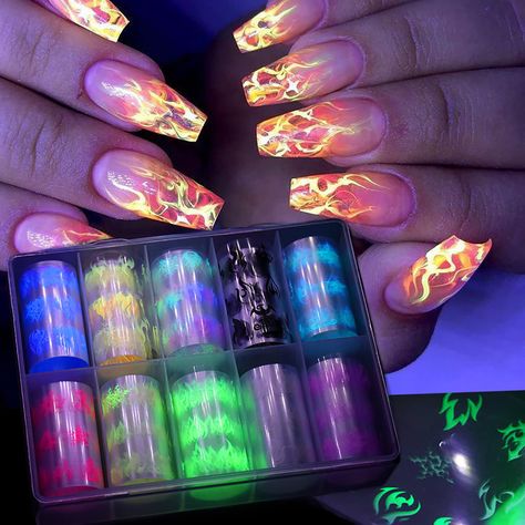 PRICES MAY VARY. 🔥【Package Content�】10 rolls flame nail art transfer foil stickers set with a storage box. 1.57inchs*39.4inchs (4*100cm). Bigger size and more attractive design. 🔥【Fluorescent Neon Flame】 The foil nail wraps is designed with fluorescent neon flame pattern, glows under UV light, allow you to design your unique nails freely, so it will make your nails more dazzling and charming.(It doesn't GLOW IN THE DARK, but rather GLOW UNDER UV LIGHT. ) 🔥【Easy To Apply】： Press the foil sticke Foil Nail Designs, Nail Art Machine, Fluorescent Nails, Flame Nail Art, Neon Nail Art, Luminous Nails, Foil Nail Art, Baby Blue Nails, Nail Foil