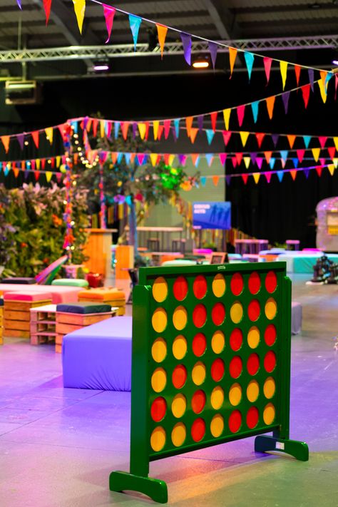 Get ready to level up your event with a playful twist! Our giant Connect Four is the perfect icebreaker for guests of all ages. Set against a backdrop of bunting flags and create the perfect festival event indoors! Check out our website for more information. Festival Event Decor, Festival Themed Party Decorations, Festival Party Theme, Indoor Festival, Giant Connect Four, Festival Themed Party, Event Booth Design, Event Photo Booth, Festival Games