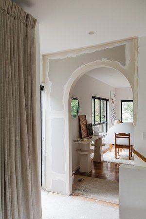 How To Make An Arched Doorway — Smor Home Adding Arches To Doorway Diy, Diy Curved Archway, Arch Living Room Wall, Adding An Archway, Arc Hallways, How To Build An Arched Doorway, Curved Door Frame, Making Arched Doorways, Arched Doorways Interior Diy