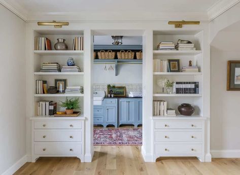 Shingle colonial style lake house with breathtaking details in Minnesota Styled Bookshelves, White Built Ins, Bookshelf Lighting, Light Gray Cabinets, Transitional Living, Transitional Living Rooms, Built In Bookcase, Built In Cabinets, Built In Desk