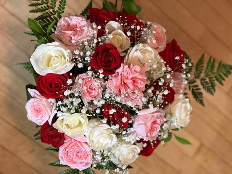 White, red and pink roses with baby’s breath #custom #created Roses And Carnation Bouquet Flower Arrangements, Red White Pink Flower Bouquet, Pink And Red Roses Bouquet Aesthetic, Red Pink And White Wedding Flowers, Red Pink White Green Bouquet, Red Pink Quince, Red White And Pink Rose Bouquet, Pink Red And White Flowers, Wedding Bouquets Red And Pink