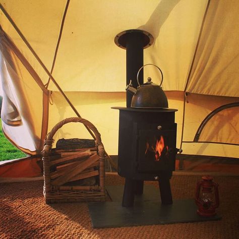 The Outbacker Hyggebell tent wood burning stove is the latest addition to the Outbacker family allowing you to camp even in colder weather. Read on to find out more.  Taken from the Danish word for snug the Hyyge offers a practical solution for longer camping trips or for fitting into cabins or sheds. The Hygge stove offers campers a durable yet portable stove solution.  Amazingly this stove offers over 4.5Kw of heat but the stove body weighs only 18kg. Alongside its beautiful curves the stove i Tent Footprint, Bell Tents, Glamping Tents, Inner Tents, Portable Stove, Tent Stove, Stove Accessories, Bell Tent, Wooden Accessories